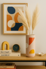 Tovi Abstract Vase. Multicoloured ceramic vase. Abstract geometric design. Hand-carved vase. Bright decorative accent. Modern ceramic décor. Artistic home accessory. Cylindrical vase. Contemporary colourful vase.