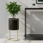 Lane Black & Gold Floor Standing Plant Pot. Black and gold indoor planter. Modern plant stand. Small and large floor planter. Luxury home décor. Minimalist gold frame planter. Contemporary plant pot.