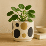 Vale Spotted Ceramic Plant Pot. Spotted ceramic plant pot. Black and gold plant pot. Handcrafted ceramic plant pot. Small and medium pot. Modern luxe décor. Minimalist home accessory. Artistic ceramic pot. Contemporary plant holder.