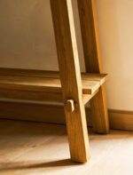 Hanborough Console Table. Recycled teak console table. Live edge console table. Rustic hallway table. Wooden console table. Trestle style table. Natural wood console. Sustainable furniture. Modern rustic furniture. Entryway console table. Teak wood furniture. Handcrafted console table. Hallway storage table. Lower shelf console table. Warm wood furniture.