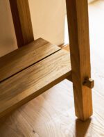 Hanborough Console Table. Recycled teak console table. Live edge console table. Rustic hallway table. Wooden console table. Trestle style table. Natural wood console. Sustainable furniture. Modern rustic furniture. Entryway console table. Teak wood furniture. Handcrafted console table. Hallway storage table. Lower shelf console table. Warm wood furniture.