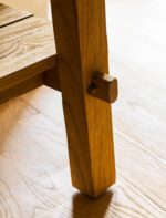 Hanborough Console Table. Recycled teak console table. Live edge console table. Rustic hallway table. Wooden console table. Trestle style table. Natural wood console. Sustainable furniture. Modern rustic furniture. Entryway console table. Teak wood furniture. Handcrafted console table. Hallway storage table. Lower shelf console table. Warm wood furniture.