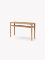 Ellwood Console Table. Oak console table. Curved edge console table. Hallway console table. Oak wood furniture. Modern classic console. Oak veneer table. Living room console table. Hallway storage table. Lower shelf console. Elegant oak furniture. Natural wood console. Timeless hallway table. Sturdy console table. Oak entryway table.