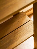 Hanborough Console Table. Recycled teak console table. Live edge console table. Rustic hallway table. Wooden console table. Trestle style table. Natural wood console. Sustainable furniture. Modern rustic furniture. Entryway console table. Teak wood furniture. Handcrafted console table. Hallway storage table. Lower shelf console table. Warm wood furniture.