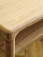 Ellwood Console Table. Oak console table. Curved edge console table. Hallway console table. Oak wood furniture. Modern classic console. Oak veneer table. Living room console table. Hallway storage table. Lower shelf console. Elegant oak furniture. Natural wood console. Timeless hallway table. Sturdy console table. Oak entryway table.