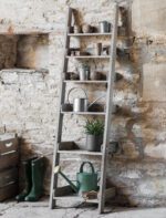 Aldsworth Shelf Ladder Unit. Rustic ladder shelf. Spruce shelving unit. Indoor outdoor ladder shelf. Wooden ladder bookcase. Plant ladder stand. Farmhouse shelving. Kitchen ladder shelf. Decorative wooden ladder. Natural wood shelf unit. Potting shed storage. Home décor ladder shelf. Multi-depth shelving unit. Rustic home storage. Folding ladder shelf.