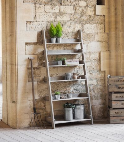 Aldsworth Wide Shelf Ladder Unit. Wooden ladder shelf. Rustic ladder shelving. Spruce shelf unit. Indoor outdoor ladder shelf. Plant ladder stand. Rustic bookshelf. Wide ladder display unit. Farmhouse style shelving. Kitchen ladder shelf. Potting shed storage. Home décor ladder shelf. Natural wood shelving unit. Folding ladder shelf. Decorative wooden ladder.