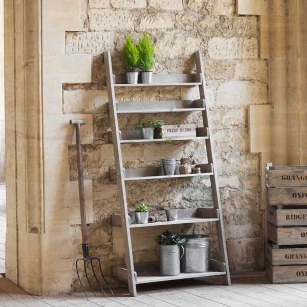 Aldsworth Wide Shelf Ladder Unit. Wooden ladder shelf. Rustic ladder shelving. Spruce shelf unit. Indoor outdoor ladder shelf. Plant ladder stand. Rustic bookshelf. Wide ladder display unit. Farmhouse style shelving. Kitchen ladder shelf. Potting shed storage. Home décor ladder shelf. Natural wood shelving unit. Folding ladder shelf. Decorative wooden ladder.