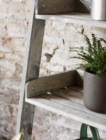 Aldsworth Wide Shelf Ladder Unit. Wooden ladder shelf. Rustic ladder shelving. Spruce shelf unit. Indoor outdoor ladder shelf. Plant ladder stand. Rustic bookshelf. Wide ladder display unit. Farmhouse style shelving. Kitchen ladder shelf. Potting shed storage. Home décor ladder shelf. Natural wood shelving unit. Folding ladder shelf. Decorative wooden ladder.