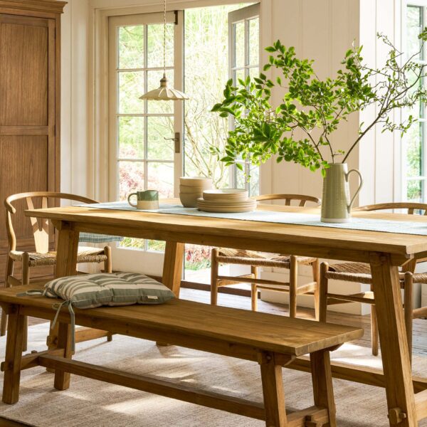 Hanborough Dining Table. Recycled teak dining table. Rustic wooden dining table. Live edge dining table. Trestle dining table. Farmhouse dining furniture. Indonesian teak furniture. Natural wood dining table. Six seater dining table. Rustic kitchen furniture. Reclaimed wood furniture. Handcrafted dining table. Warm wood dining table. Rustic dining room table. Solid teak dining table.