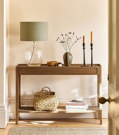 Chesterton Console Table. Wooden console table. Natural wood console. Bayur wood console. Mindi veneer console table. Rattan top console. Hallway console table. Rustic console furniture. Modern natural console. Handcrafted wooden table. Living room console table. Warm wood furniture. Stylish hallway storage. Indonesian wood furniture. Versatile console table.