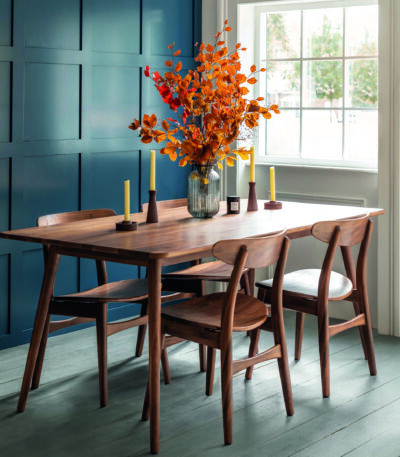 Kersoe Walnut Dining Table. Solid walnut dining table. Walnut wood table. Modern walnut dining table. Six to eight seater dining table. Contemporary dining table. Tapered leg dining table. Natural wood dining furniture. Warm walnut table. Minimalist walnut table. Stylish dining room table. Premium wooden dining table. Mid-century style table. Walnut kitchen table. Elegant dining furniture.