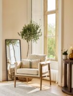 Kennington Armchair. Modern armchair. Ash wood armchair. Neutral upholstered armchair. White armchair. Green armchair. Contemporary accent chair. Living room armchair. Bedroom accent chair. Scandinavian style chair. Minimalist armchair. Upholstered timber chair. Comfortable accent seating. Modern home furniture. Ready assembled armchair.