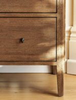 Chesterton Chest of Drawers. Wooden chest of drawers. Natural wood drawers. Rattan top drawers. Bayur wood furniture. Mindi veneer drawers. Brass handle chest. Wooden drawer unit. Bedroom storage drawers. Living room storage furniture. Handcrafted wood chest. Rustic bedroom furniture. Warm wood furniture. Solid wood drawers. Modern natural storage.