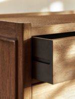 Chesterton Chest of Drawers. Wooden chest of drawers. Natural wood drawers. Rattan top drawers. Bayur wood furniture. Mindi veneer drawers. Brass handle chest. Wooden drawer unit. Bedroom storage drawers. Living room storage furniture. Handcrafted wood chest. Rustic bedroom furniture. Warm wood furniture. Solid wood drawers. Modern natural storage.