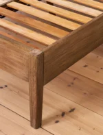 Chesterton King Bed. Wooden king bed. Rattan headboard bed. Bayur wood furniture. Mindi wood veneer bed. Natural wood bed frame. Handcrafted king bed. Solid timber slat bed. Rustic bedroom furniture. Modern natural bedroom. Boho bedroom bed. Coastal style bed. Warm wood bed. Indonesian wooden furniture. Premium king bed.