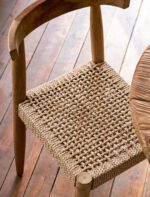 Hawthorne Set of 2 Dining Chairs. Reclaimed teak dining chairs. Teak and hyacinth chairs. Indoor outdoor dining chairs. Rustic wooden chairs. Sustainable dining furniture. Indonesian teak chairs. Natural woven seat chairs. Farmhouse dining chairs. Rustic dining room seating. Patio dining chairs. Eco-friendly furniture. Teak chair set. Weatherproof teak chairs. Handcrafted dining chairs.