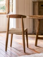 Hawthorne Set of 2 Dining Chairs. Reclaimed teak dining chairs. Teak and hyacinth chairs. Indoor outdoor dining chairs. Rustic wooden chairs. Sustainable dining furniture. Indonesian teak chairs. Natural woven seat chairs. Farmhouse dining chairs. Rustic dining room seating. Patio dining chairs. Eco-friendly furniture. Teak chair set. Weatherproof teak chairs. Handcrafted dining chairs.