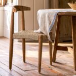 Hawthorne Set of 2 Dining Chairs. Reclaimed teak dining chairs. Teak and hyacinth chairs. Indoor outdoor dining chairs. Rustic wooden chairs. Sustainable dining furniture. Indonesian teak chairs. Natural woven seat chairs. Farmhouse dining chairs. Rustic dining room seating. Patio dining chairs. Eco-friendly furniture. Teak chair set. Weatherproof teak chairs. Handcrafted dining chairs.