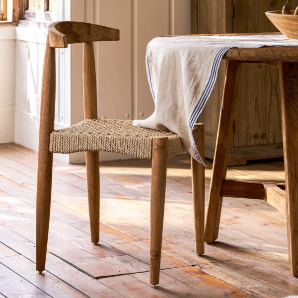 Hawthorne Set of 2 Dining Chairs. Reclaimed teak dining chairs. Teak and hyacinth chairs. Indoor outdoor dining chairs. Rustic wooden chairs. Sustainable dining furniture. Indonesian teak chairs. Natural woven seat chairs. Farmhouse dining chairs. Rustic dining room seating. Patio dining chairs. Eco-friendly furniture. Teak chair set. Weatherproof teak chairs. Handcrafted dining chairs.