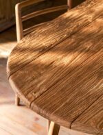 Hawthorne Oval Dining Table. Reclaimed teak dining table. Oval wooden dining table. Large rustic dining table. Indoor outdoor dining table. Indonesian teak furniture. Sustainable dining furniture. Weatherproof teak table. Farmhouse style dining table. Rustic oval table. Natural wood dining table. Eight seater dining table. Solid teak table. Textured wood table. Eco-friendly dining table.