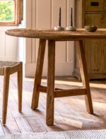 Hawthorne Oval Dining Table. Reclaimed teak dining table. Oval wooden dining table. Large rustic dining table. Indoor outdoor dining table. Indonesian teak furniture. Sustainable dining furniture. Weatherproof teak table. Farmhouse style dining table. Rustic oval table. Natural wood dining table. Eight seater dining table. Solid teak table. Textured wood table. Eco-friendly dining table.