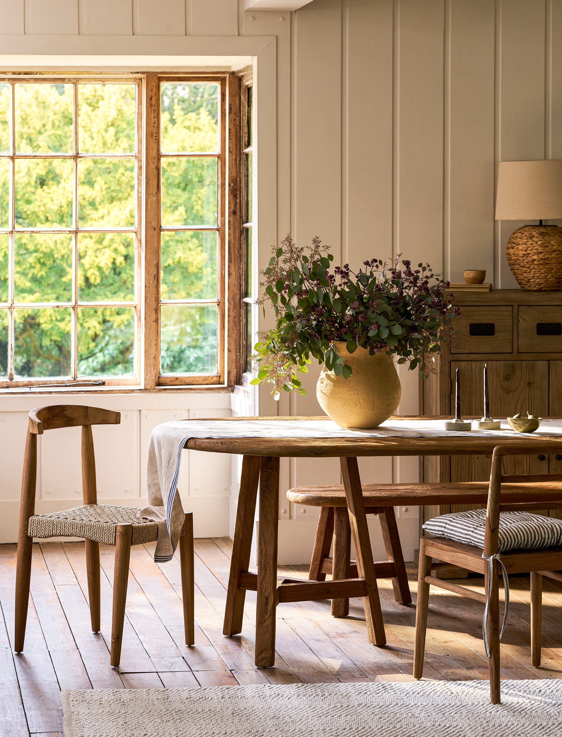 Hawthorne Oval Dining Table Hawthorne Oval Dining Table. Reclaimed teak dining table. Oval wooden dining table. Large rustic dining table. Indoor outdoor dining table. Indonesian teak furniture. Sustainable dining furniture. Weatherproof teak table. Farmhouse style dining table. Rustic oval table. Natural wood dining table. Eight seater dining table. Solid teak table. Textured wood table. Eco-friendly dining table.