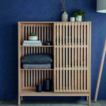 Linear Large Storage Cabinet. Natural ash cabinet. Sliding door storage unit. Modern storage cabinet. Vertical line cabinet. Minimalist storage furniture. Exposed shelving cabinet. Contemporary storage unit. Living room cabinet. Dining room storage. Home office storage. Scandinavian style cabinet. Modern wood cabinet. Tall storage unit. Functional home storage.