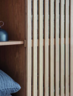 Linear Large Storage Cabinet. Natural ash cabinet. Sliding door storage unit. Modern storage cabinet. Vertical line cabinet. Minimalist storage furniture. Exposed shelving cabinet. Contemporary storage unit. Living room cabinet. Dining room storage. Home office storage. Scandinavian style cabinet. Modern wood cabinet. Tall storage unit. Functional home storage.