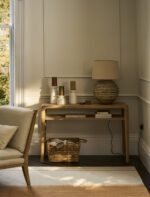 Ellwood Console Table. Oak console table. Curved edge console table. Hallway console table. Oak wood furniture. Modern classic console. Oak veneer table. Living room console table. Hallway storage table. Lower shelf console. Elegant oak furniture. Natural wood console. Timeless hallway table. Sturdy console table. Oak entryway table.