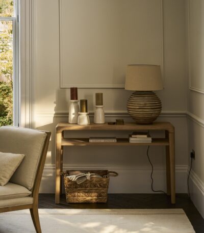 Ellwood Console Table. Oak console table. Curved edge console table. Hallway console table. Oak wood furniture. Modern classic console. Oak veneer table. Living room console table. Hallway storage table. Lower shelf console. Elegant oak furniture. Natural wood console. Timeless hallway table. Sturdy console table. Oak entryway table.