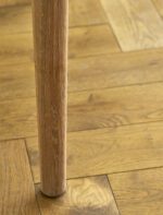 Ellwood Console Table. Oak console table. Curved edge console table. Hallway console table. Oak wood furniture. Modern classic console. Oak veneer table. Living room console table. Hallway storage table. Lower shelf console. Elegant oak furniture. Natural wood console. Timeless hallway table. Sturdy console table. Oak entryway table.