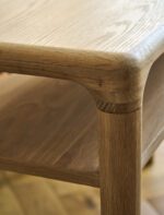 Ellwood Console Table. Oak console table. Curved edge console table. Hallway console table. Oak wood furniture. Modern classic console. Oak veneer table. Living room console table. Hallway storage table. Lower shelf console. Elegant oak furniture. Natural wood console. Timeless hallway table. Sturdy console table. Oak entryway table.